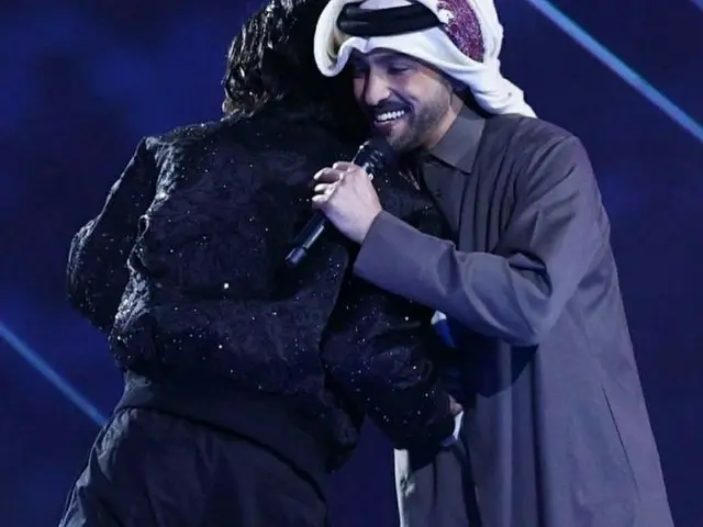Fahd Al Qubaisi, a popular Qatari singer who appeared at the World Cup openingceremony with JUNG KOO