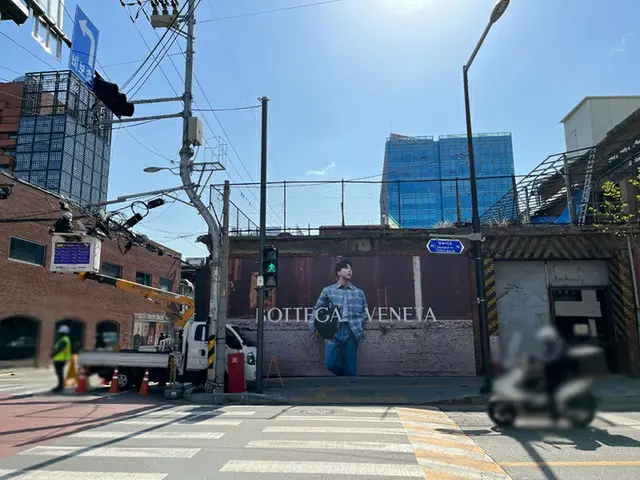 RM, A huge advertisement in the Seoul city. . .