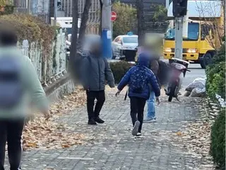 韩国首尔的流感病例比去年同期增加了12倍，其中小学和初中学生的病例激增。