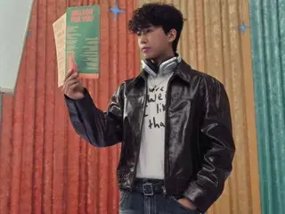 歌手林英雄烫了个卷发，展现了他出众的造型。