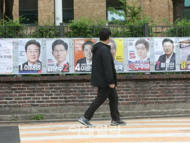 公交车站出现“不要选择候选人 OO”的涂鸦和印刷品......要求调查 = 韩国济州岛