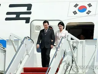 李总统抵达华盛顿与特朗普举行首次峰会