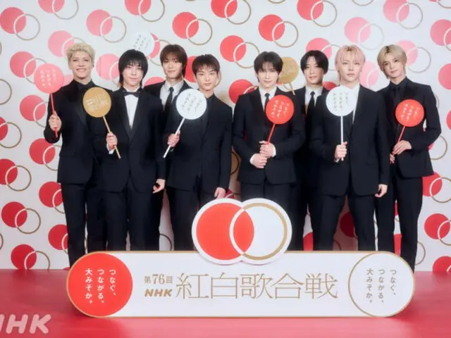 &TEAM 成员们身着西装，显得庄重而威严……“登上红白歌合战的舞台是我们的目标和梦想之一”。